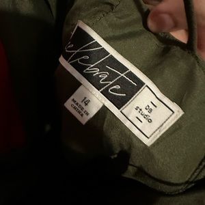 David’s bridal olive green size 14 has pockets and high slit to one side